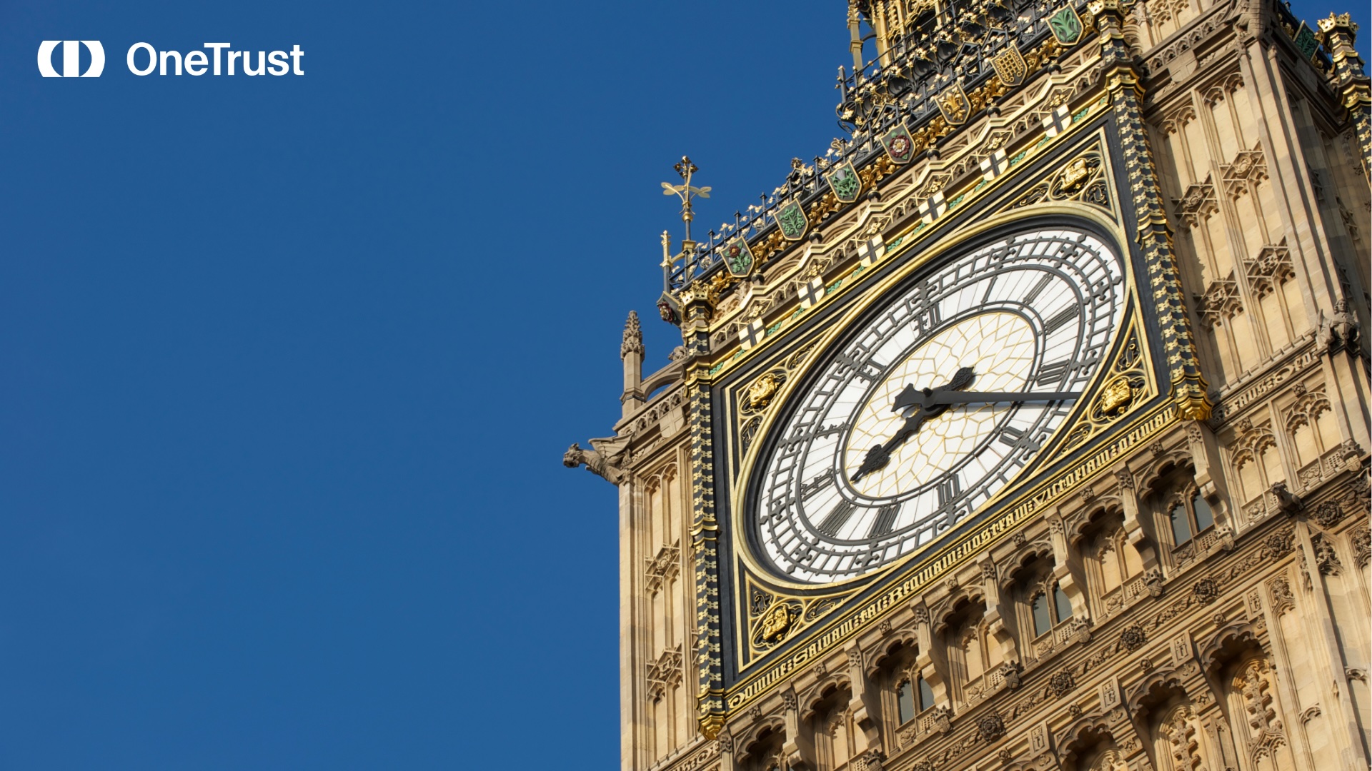 OneTrust logo beside a close-up of the Elizabeth Tower clock face in London against a clear blue sky.