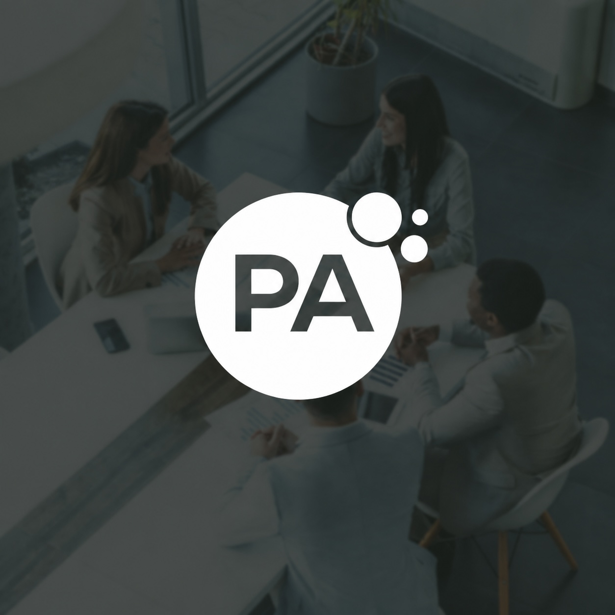 PA Consulting logo superimposed over an image of businesspeople meeting.